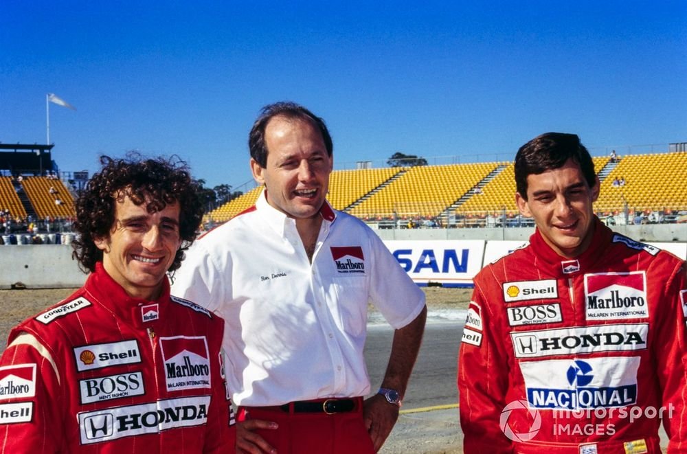 Alain Prost, Ron Dennis, and Ayrton Senna.