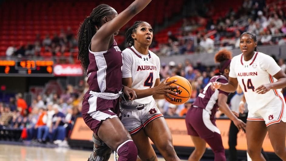 Auburn beats Aggies, sets program attendance record