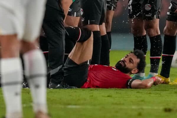 Egypt's Mohamed Salah receives medical treatment during the African Cup of Nations Group B soccer match between Egypt and Ghana in Abidjan, Ivory Coast, Thursday, Jan.18, 2024. (AP Photo/Themba Hadebe)